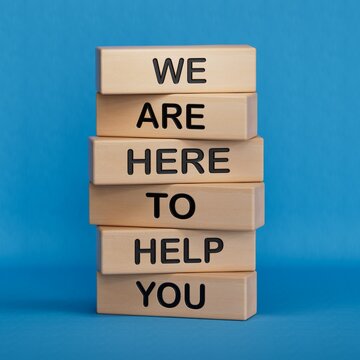 We are here to help you symbol. Concept words we are here to help you on wooden blocks.Business and we are here to help you concept.3D rendering on blue background.