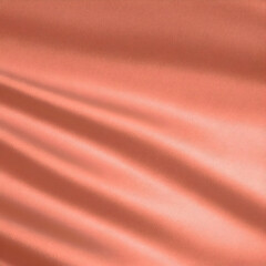 Smooth Peach Fabric Gently Flows and Creates Soft Waves in Elegant Simplicity