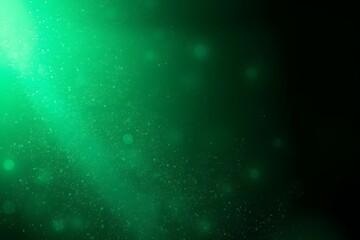 Fototapeta premium A vibrant green abstract background with soft particles and light effects.