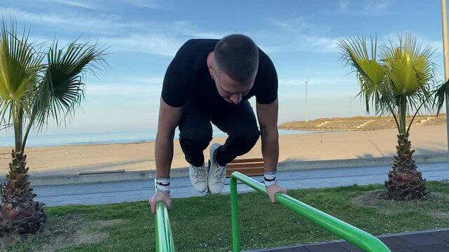 athlete and parallel bars