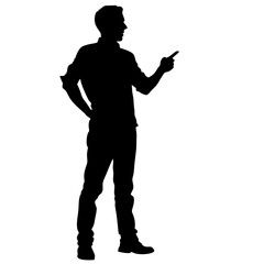 A man is standing in front of a white background. He is wearing a black shirt and black pants. He is holding a finger up in the air