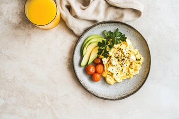 High-protein breakfast with scrambled tofu, avocado, and roasted tomatoes
