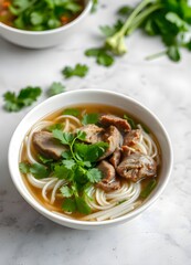 A Platter Of Fresh Vietnamese Pho With Rice Noodles, Fresh Herbs, Thinly Sliced Beef, And A Bowl Of Fragrant Broth