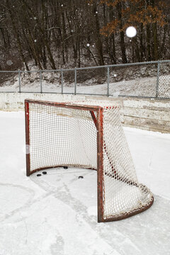 Rustic Hockey Goal on a Snowy Outdoor Rink