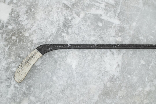 Close-Up of Hockey Stick on Icy Surface