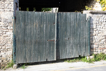 Old vintage wooden gate traditional ancient house