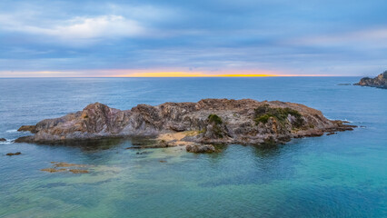Cloud-covered sunrise over Guerilla Bay
