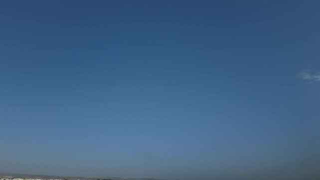 A takeoff at the pilot&rsquo;s eyes taking off from a hort runway in sunny unclouded blue sky. An immersive pilot&rsquo;s perspective. Hyperlapse. 4K
