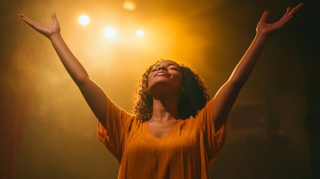 Young woman letting go of problems , and feeling free with arms in the air. Praise and worship concept. - Powered by Adobe