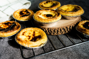 Stack of portuguese egg tart, homemade egg tart dessert. Traditional Portuguese dessert
