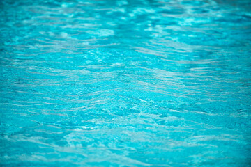 Water in swimming pool, background with high resolution. Wave abstract or rippled water texture.
