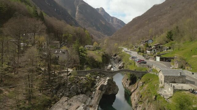 Stunning Valle Verzasca in Switzerland captured by drone, lush mountains, tranquil river, and charming villages. Ideal for adventure seekers and nature lovers, it offers numerous outdoor activities