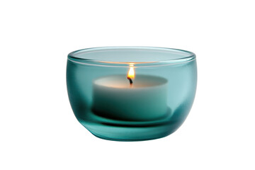 Elegant teal glass candle holder with a burning white candle in a serene setting