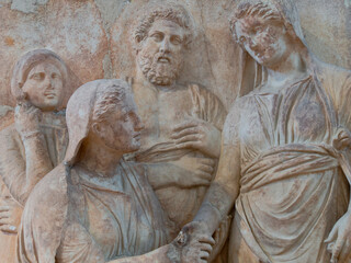 The grieving family. Part of a votive burial stele by Keramikos. National Archaeological Museum....