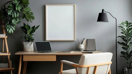 Fototapeta premium Design an empty wooden frame mockup on the wall of your home office, placed above a modern desk with a laptop and plants.