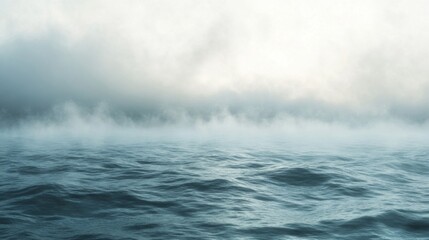 Obraz premium Foggy Ocean Landscape with Rolling Waves