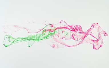 Delicate trails of neon pink and green paint suspended in crystal-clear water, isolated on a white background