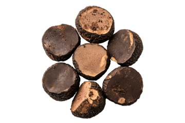 Fresh black Norcia truffles isolated on white transparent background, great for culinary and gourmet themes.