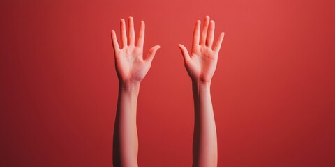 Vibrant Retro Aesthetic Uplifted Hands on Minimalist Red Background for Youthful Event Promotion and Social Media Campaigns - Capturing Dynamic Energy and Unity in Cultural Celebrations