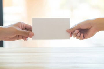 Obraz premium Cozy Minimalist Aesthetic Close-Up of Thank-You Card Exchange on Polished Wood - Enhancing Corporate Culture and Employee Engagement in Modern Workspaces