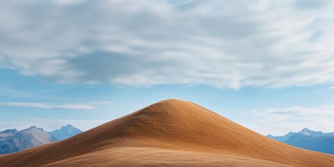 Scenic Mountain Horizon Soft Textured Golden Hill against Sky with Clouds - Ideal for Adventure Travel Marketing and Landscape Tourism Promotions