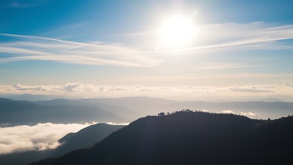 Obraz premium Serene sunset over majestic mountain ranges with a sea of clouds below, a scenic view, peaceful atmosphere