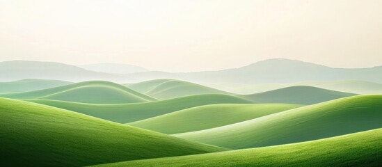 Obraz premium Green rolling hills landscape with soft gradients and muted tones featuring Copy Space for text placement