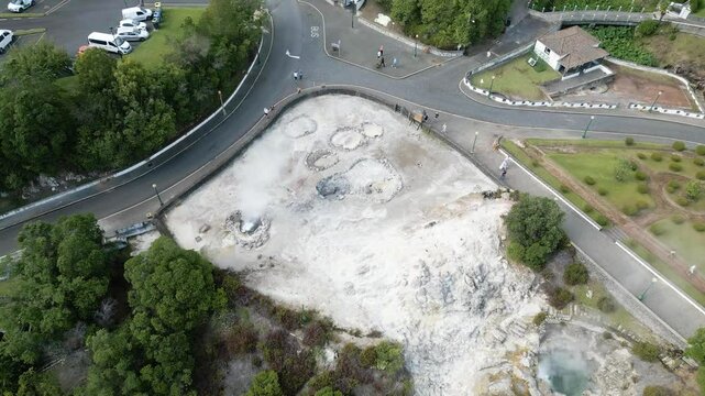 Furnas village with hot thermal springs aerial 4K drone video footage, Sao Miguel Island, Azores, Portugal. Caldeira do Asmodeu