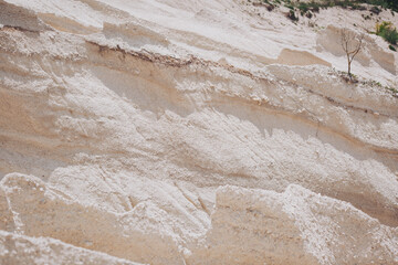 Chalk hills. Limestone quarry. Open-cast mining.  Chalk surface. Natural limestone. 
