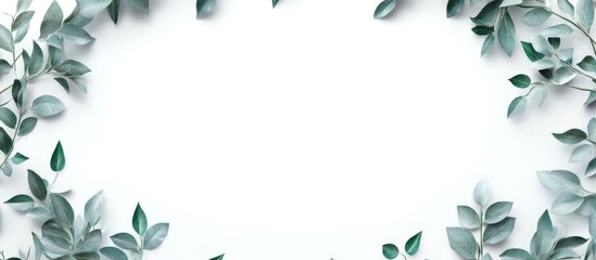 Naklejka premium Green foliage border frame design with light background and ample copy space for text placements. Ideal for nature-themed presentations.