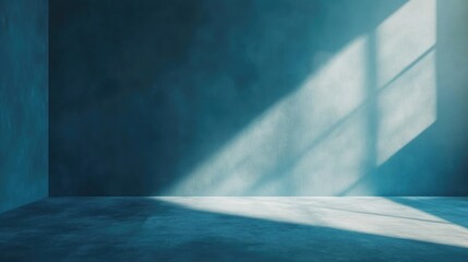 Empty room interior with blue walls and sunlight casting shadows on the floor Copy Space