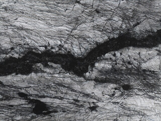 Drone shot looking down on pattern in a glacier