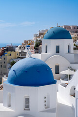White houses with blue roof on Santorini