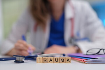 A doctor examines trauma notes in a clinical setting, highlighting the urgent need for medical care