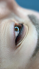 permanent eyeliner makeup close up. Healthy and clean skin young woman