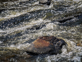 Colorful Rock In River Waves