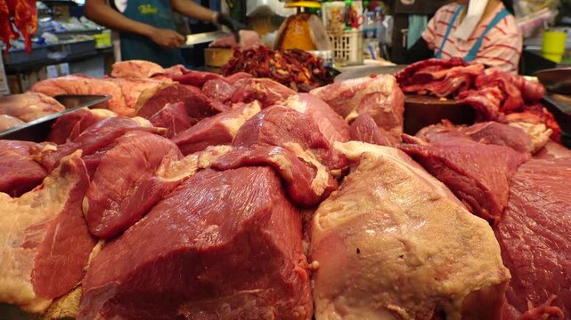 BANGKOK, THAILAND - AUGUST 2024 : Fresh meat sold at the local market.