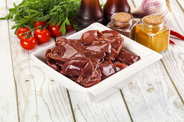 Raw chicken liver uncooked in the bowl