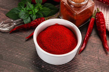 Spicy dry paprika powder in the bowl