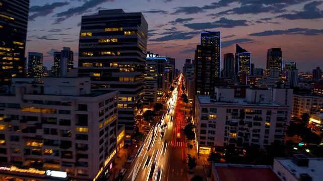 Make a time-lapse film of a bustling cityscape from dawn to dusk, capturing the change of daylight, the motion of clouds, and the commotion of people, traffic, and lights as night falls.