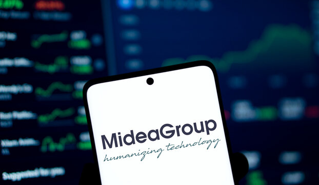 Dhaka, Bangladesh- 30 Dec 2024: Midea group logo is displayed on smartphone. Midea Group is a Chinese electrical appliance manufacturer company.