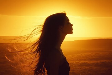 A woman is standing in front of a large red sun