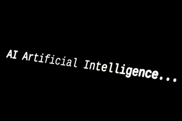 Black computer screen, with the text AI Artificial Intelligence. Use and evolution of artificial intelligence.