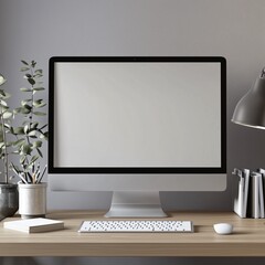 A desktop computer with a blank screen in a minimal office. 