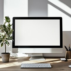 A desktop computer with a blank screen in a minimal office.