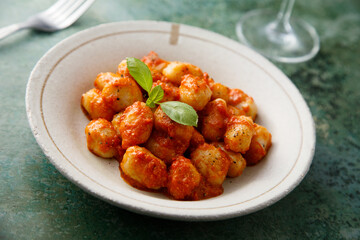 Traditional potato gnocchi with tomato sauce