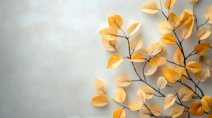 Golden autumn leaves on marble, copy space, fall background, design element