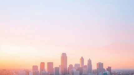 Fototapeta premium vibrant city skyline at sunset, showcasing tall buildings and colorful sky