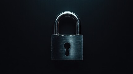 Naklejka premium A steel padlock with a visible locking mechanism on a bold black background, powerful and robust