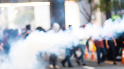 Obraz premium Tear Gas in Riot Blur – A blurred image of tear gas dispersing during a protest or riot. 